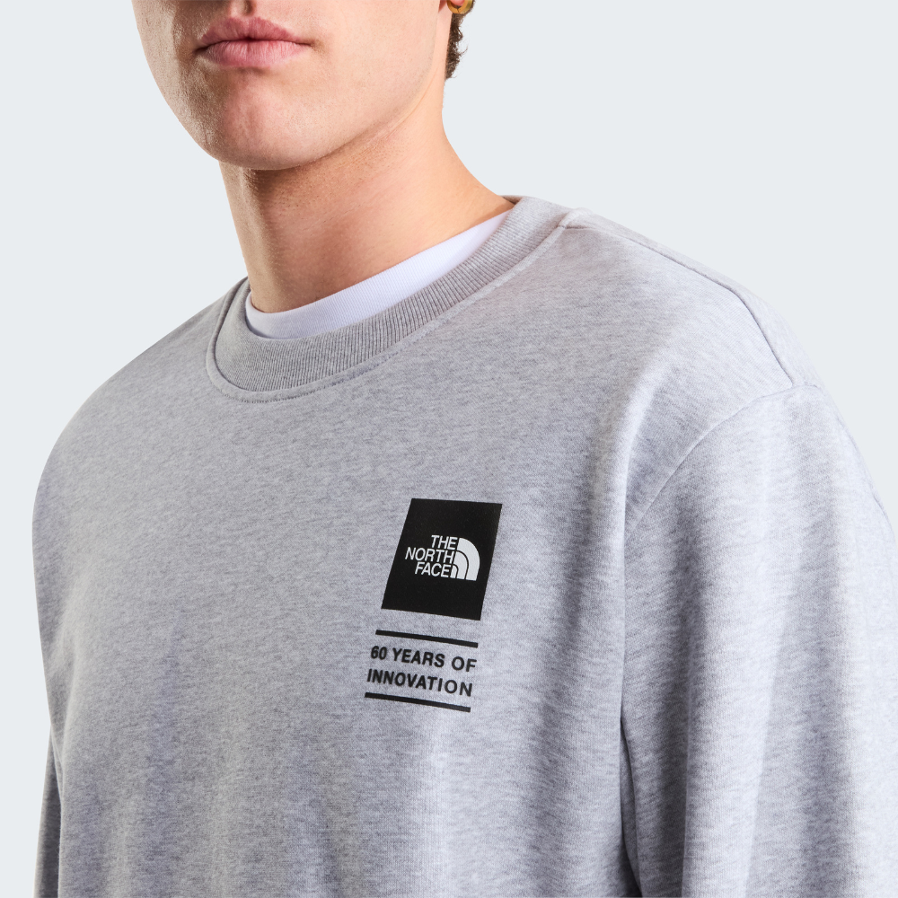 UNISEX TNF CELEBRATION RELAXED GRAPHIC SWEATSHIRT
