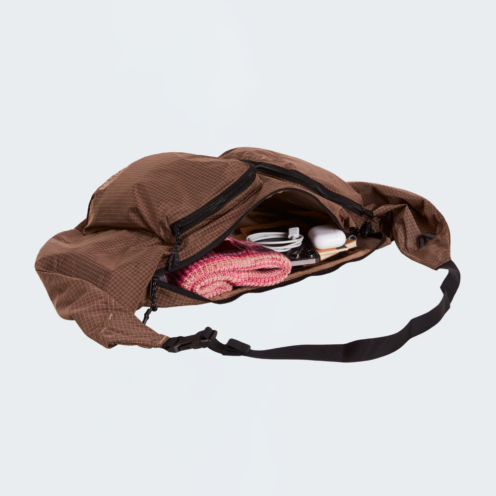 NEVER STOP UTILITY SLING BAG